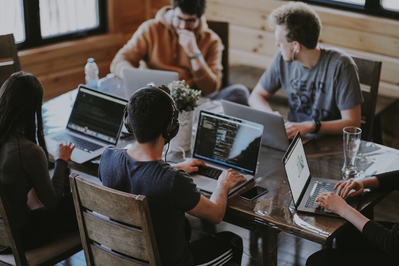 Team members collaborating together in a bright workspace